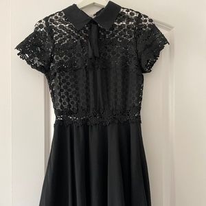 Black skater dress with embroidery